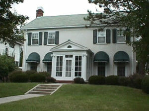 Residential dome awnings with scalloped valances in Minnesota