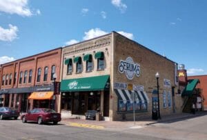 Serum's Bar with awnings on the front and side of the building