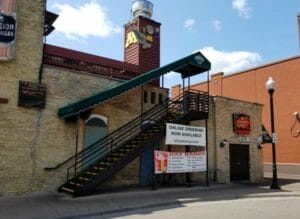 Covered staircase on back of Serums restaurant in Twin Cities