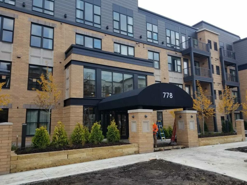 Half Barrel Canopy over Apartment Building Entrance