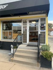 Before side curtains picture of Nokomis Tattoo in Minneapolis