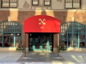 Front crown graphics on Minneapolis hotel entryway