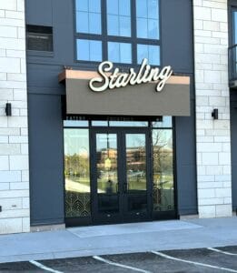 Starling restaurant entrance with decorative canvas panel in the Twin Cities