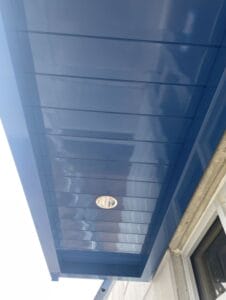 Commercial canopy light and scupper close up