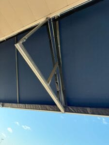 Close up of bird netting under an awning