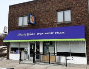 A close up of a new awning at Simply Jane on Cedar Ave S in MN