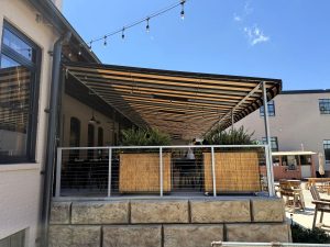 Underside of the custom patio with lights by Acme Awning