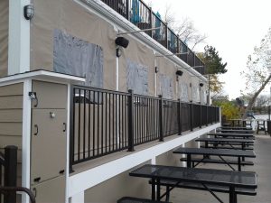 Seasonal panels with vinyl windows for a commercial application