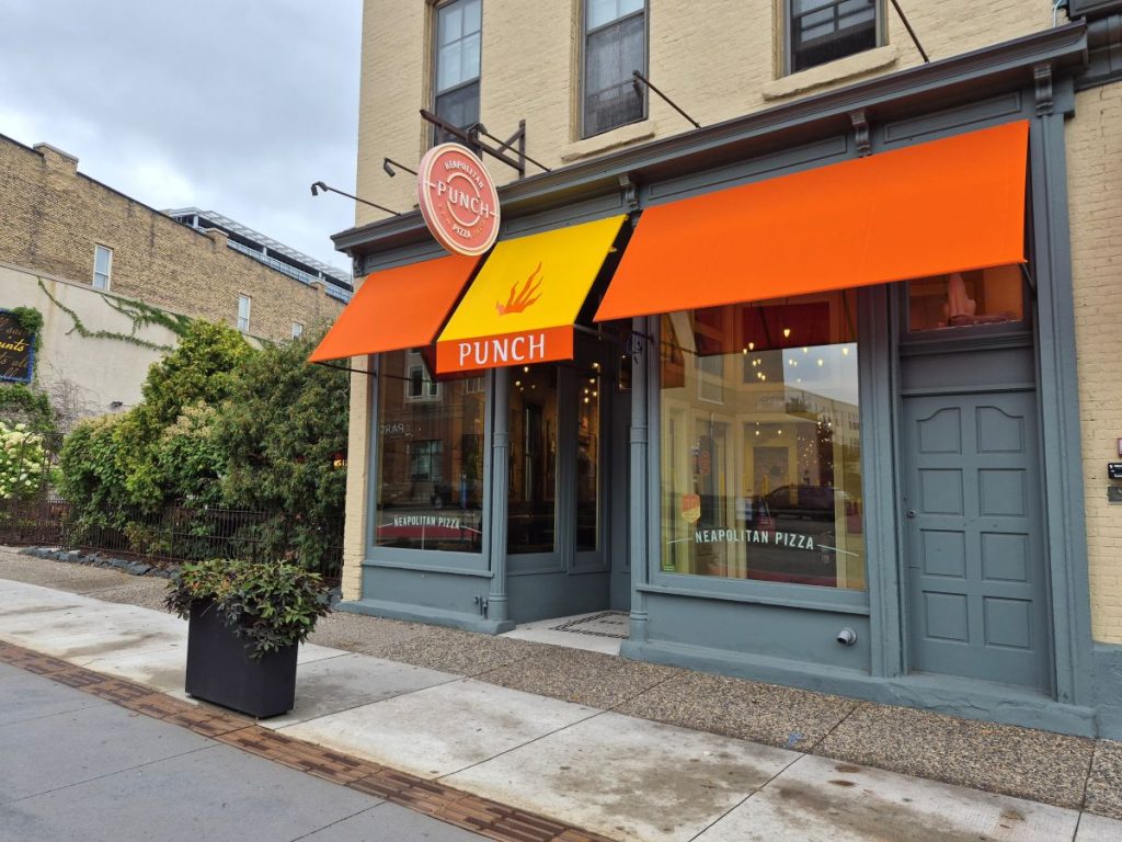 Punch Pizza colorful awnings with their logo in Minneapolis